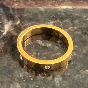 Gold ring with cubic zirconia stones